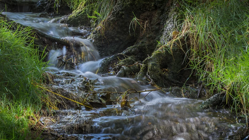 Clear water babbling over rocks in a brook
