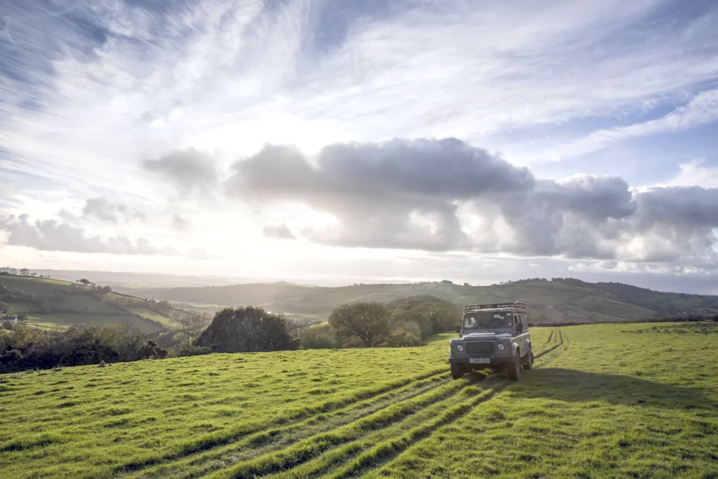 Land Rover on farm land hillside